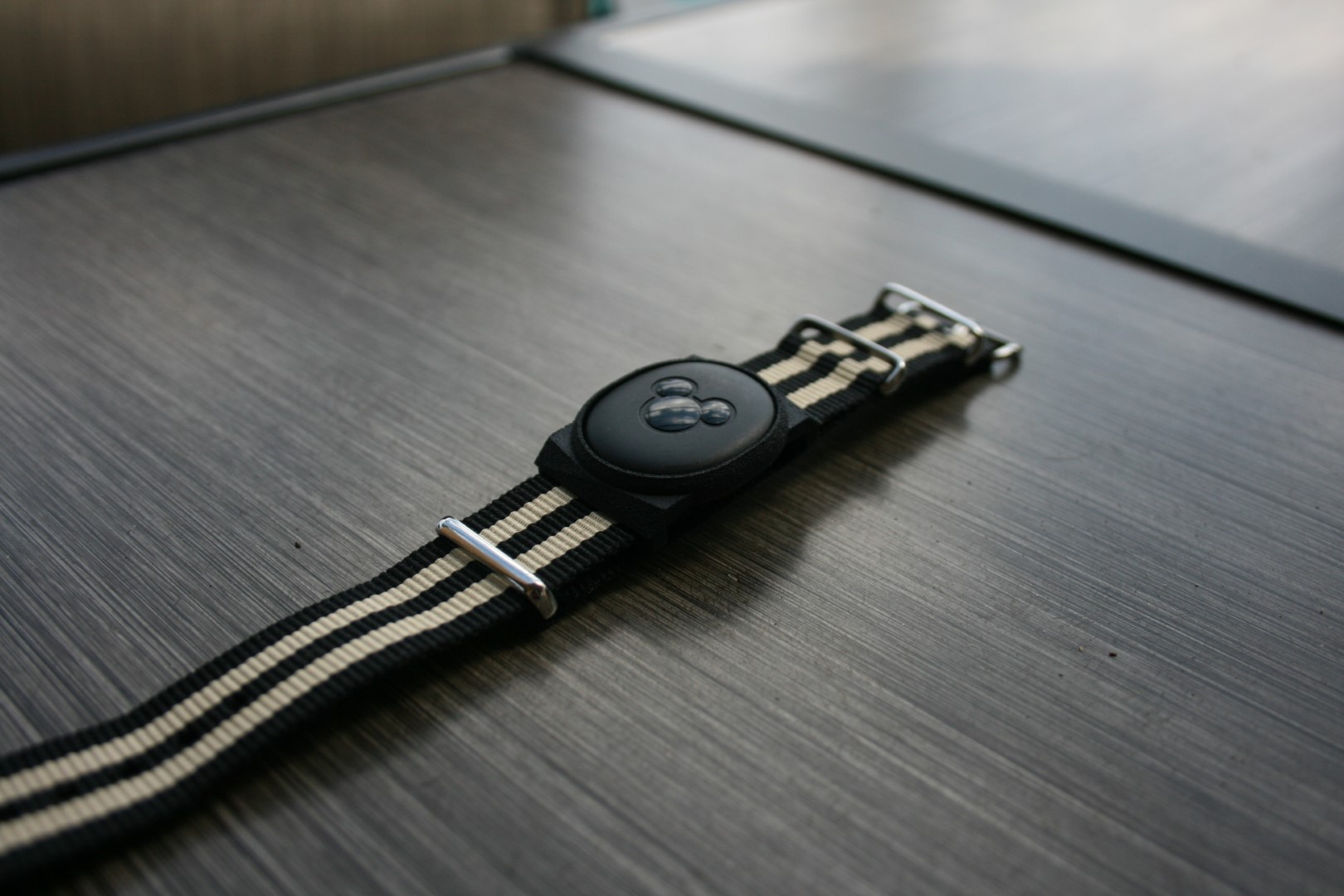 A magic-band sits on a table